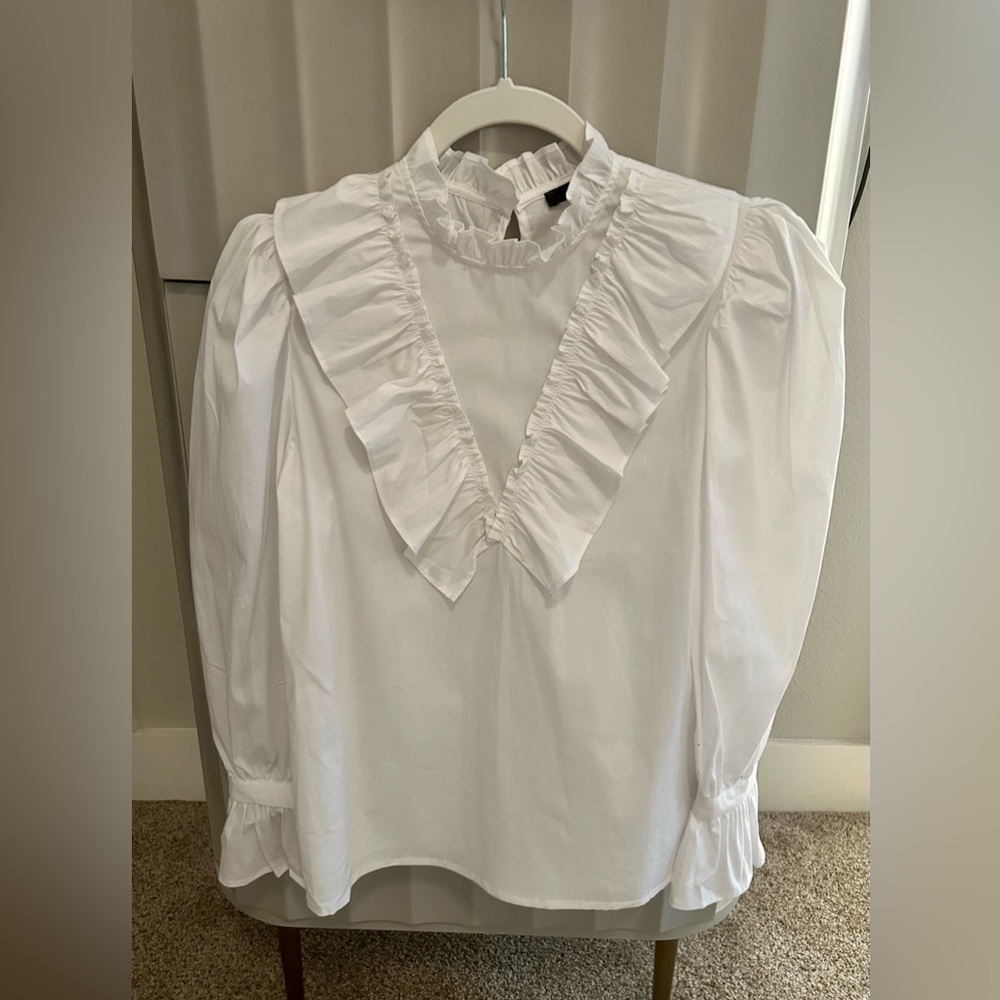 White ruffle blouse size small